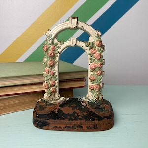Vintage Chippy Floral Arch Cast Iron Door Stop