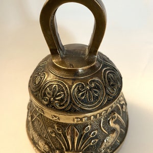 Heavy weight antique hand held highly decorative brass bell with very loud bell ringer