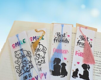 Pet friendship-themed bookmark. Choose from several designs: a gang of kittens, a girl and dog, or a girl and a kitten.