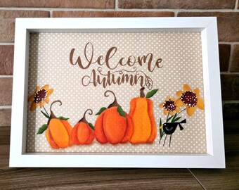 Decorative autumn-themed frame featuring pumpkins, flowers, and a cute blackbird, completely hand-painted. Welcome autumn!