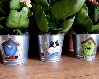 Set of three plant pots with hand-painted subjects in country painting style