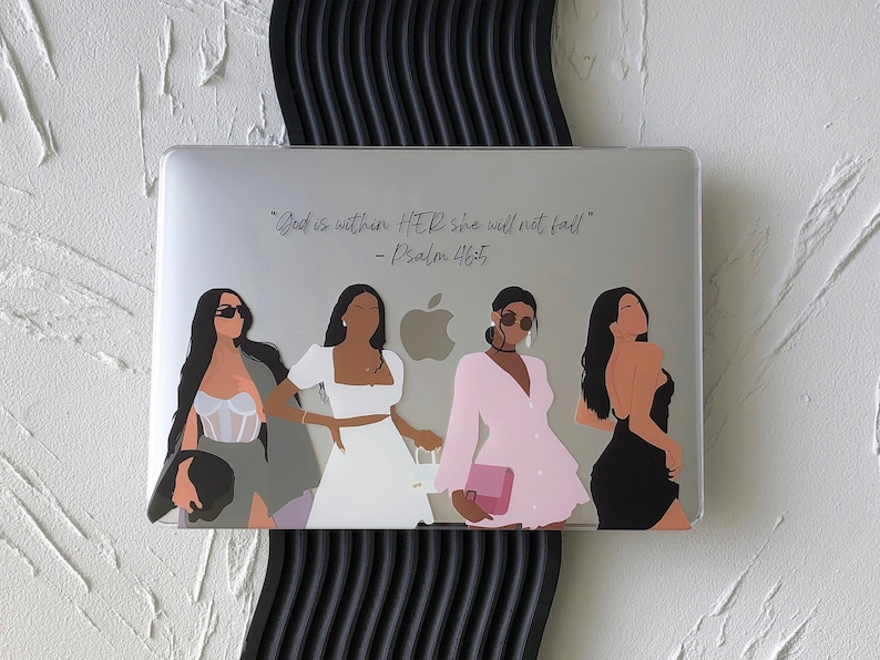 May include: A laptop with a sticker featuring four women in different outfits and the quote "God is within HER she will not fail!" - Psalm 46:5.