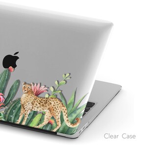 May include: A clear laptop case with a watercolor design featuring a leopard, cacti, and tropical plants. The design is on the back of the laptop case.
