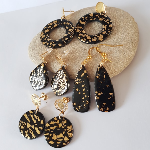 Boucles d'oreilles noir or,boucles d'oreilles originales,boucles d'oreilles soirée chic,feuilles  d'or,boucles d'oreilles ajourées,cercle