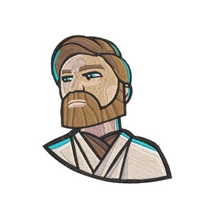 May include: Embroidered patch of a cartoon character with brown hair and a beard, wearing a white robe with a blue outline. The character has a serious expression.