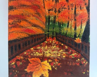 May include: A rectangular canvas painting depicting an autumn scene with a path covered in fallen leaves. The composition features vibrant orange and red trees lining the walkway, with a large, detailed yellow maple leaf in the foreground.