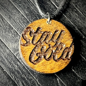 Stay gold engraved wood charm cord necklace..