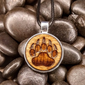 Bear paw.... engraved wood charm cord necklace...