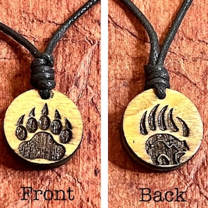 Native Bear paw  2 sided wood engraved black waxed  cord necklace with clasp.