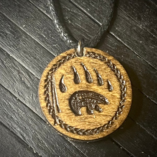 Native spirit engraved wood charm cord necklace..