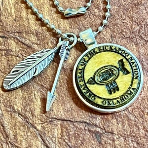 Kickapoo Nation of Oklahoma wood engraved Metal bezel pendant ball chain necklace with charms