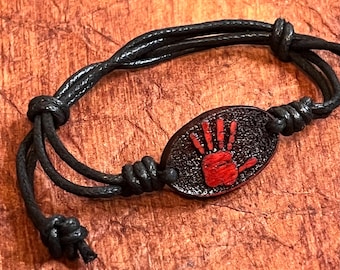 Indigenous red handprint mmiw symbol oval wood engraved pendant adjustable cord bracelet