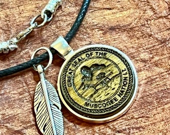 Muscogee Nation  wood engraved Metal bezel pendant black cord necklace with feather charm