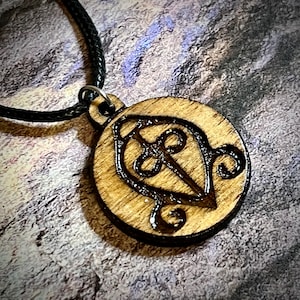 Cherokee symbol for power of love wood engraved pendant cord adjustable necklace