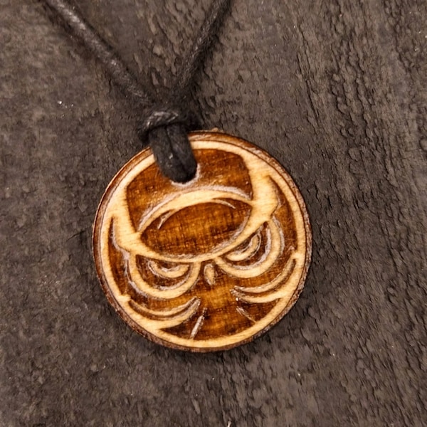 Owl totem engraved wood charm cord necklace.