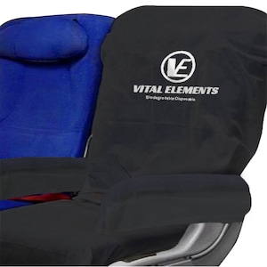 May include: Black seat cover with the Vital Elements logo and the text "Biodegradable Disposable". The cover is over a blue seat with a headrest.