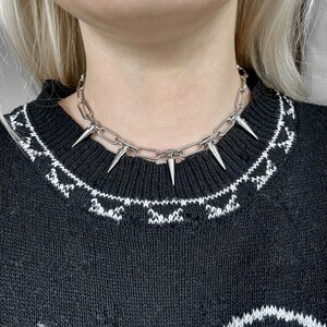 Chunky stainless steel choker with silver spike pendants