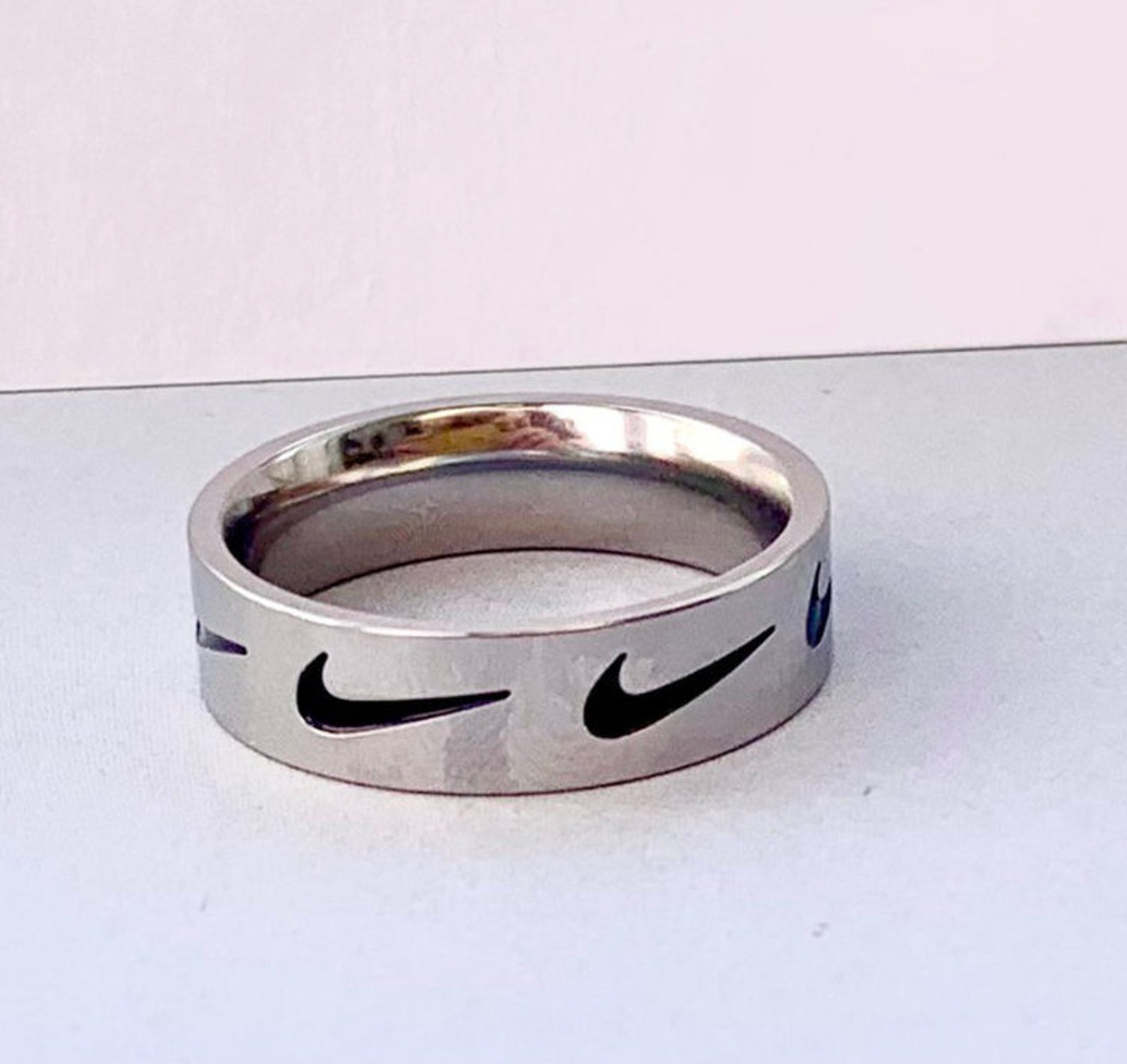 nike tick ring