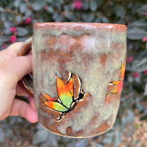 Hand-Painted Butterfly Pottery Mug: Bright Colors, Unique Design