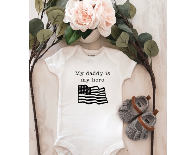 My daddy is my hero baby onesie ; patriotic onesie ; army dad onesie ; police dad onesie ; LEO ; blue lives matter ; american hero