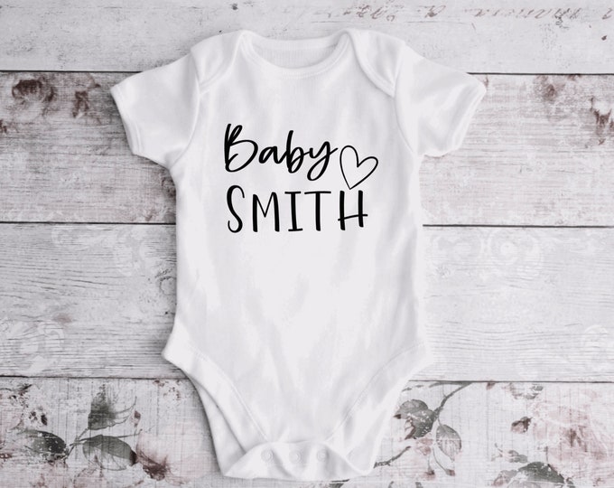 Personalized Name Baby Onesie® ; custom onesie ; baby onesie ; custom baby shower gift ; coming soon ; birth announcement