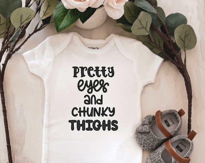 Pretty Eyes and Chunky Thighs Baby Onesie®