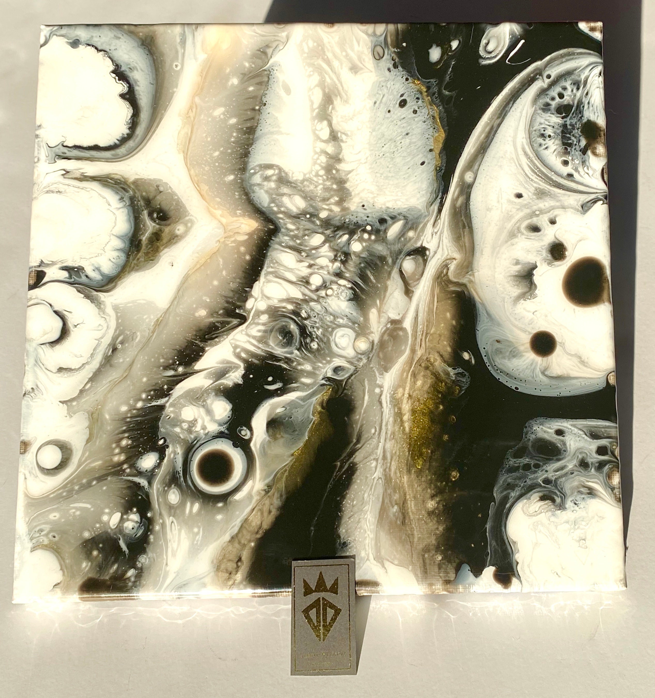 Epoxy Resin Abstract Fluid Art With Black and White Colors and Floating