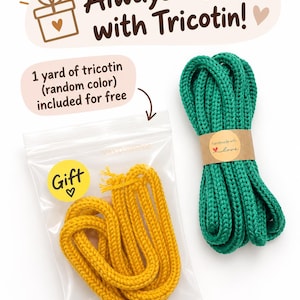 May include: A yellow knitted cord in a clear plastic bag with a yellow gift sticker and a green knitted cord wrapped in a brown paper band labeled handmade with love. Text reads Always a Gift with Tricotin and 1 yard of tricotin included.