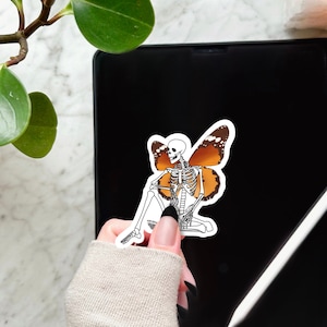 Spooky season sticker, skeleton wings sticker, halloween sticker, goth aesthetic, skeleton moth sticker, dark cottagecore sticker