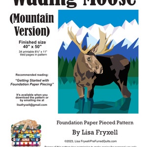 May include: A foundation paper pieced pattern titled "Wading Moose (Mountain Version)" by Lisa Fryxell. The image features a stylized moose in water with a mountain backdrop. Finished size is 101.6cm x 127cm. The pattern is designed in the U.S.A.