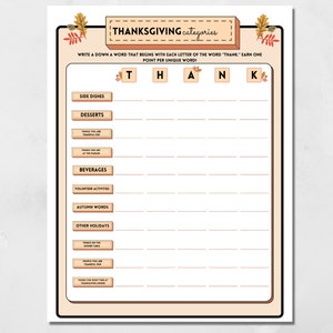 Thanksgiving Categories printable fall game with autumn-themed design featuring colorful leaves is shown.