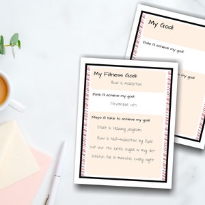 May include: A printable goal setting worksheet with a pink and white striped border. The worksheet is titled "My Fitness Goal" and includes the text "Run a marathon". The worksheet also includes sections for the date the goal will be achieved, and steps to take to achieve the goal.