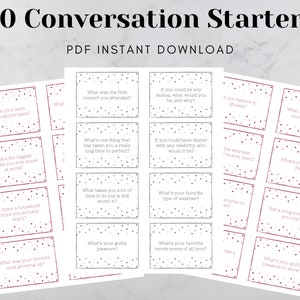 May include: A printable set of 80 conversation starter cards with a pink and gray polka dot pattern. The cards are designed to help people get to know each other better. The text on the cards includes questions like "What was the first concert you attended?" and "What's your favorite type of weather?"