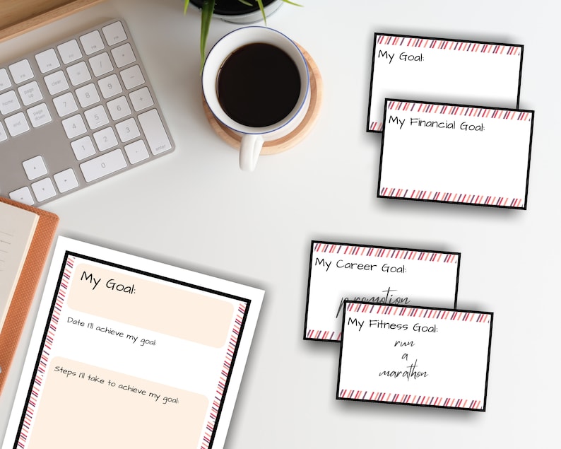 May include: A set of printable goal setting cards with red and white stripes. The cards have the text "My Goal", "My Financial Goal", "My Career Goal", and "My Fitness Goal".