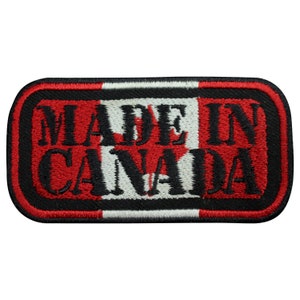 Peut inclure: Écusson brodé avec un motif de drapeau canadien rouge et blanc et le texte "MADE IN CANADA" en noir.