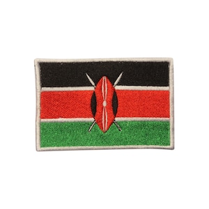 May include: Embroidered patch of the Kenyan flag. The flag is black, red, and green with a white shield and two spears in the center.