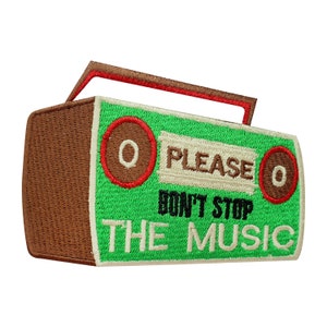 May include: Green and brown embroidered patch shaped like a vintage boombox with the text "Please Don't Stop The Music".