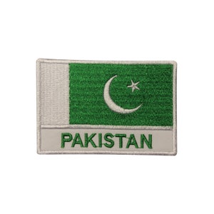 May include: Embroidered patch featuring the flag of Pakistan. The patch is white with a green rectangle containing a white crescent moon and a white five-pointed star. The words "PAKISTAN" are embroidered in white below the flag.