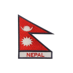 May include: Embroidered patch featuring the flag of Nepal. The patch is red with a white crescent moon and star in the top left corner and a white 12-pointed star in the bottom right corner. The word "NEPAL" is written in white on a grey background at the bottom of the patch.