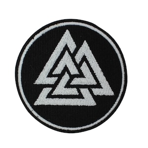 May include: A black and white embroidered patch featuring the Valknut symbol, a Norse symbol of connection and the afterlife. The patch is circular and has a white border.