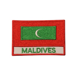 May include: An embroidered patch featuring the flag of the Maldives. The patch is red with a green rectangle in the center, containing a white crescent moon. The text "MALDIVES" is written in white below the flag.