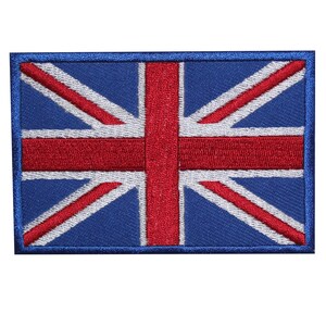 May include: Rectangular embroidered patch depicting the Union Jack, the flag of the United Kingdom. The design features a blue background with red and white crosses, and a blue border. The patch is suitable for clothing.