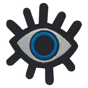 Peut inclure: Un œil noir et blanc avec un iris bleu et des cils. L'œil est un symbole populaire de protection et de bonne chance.