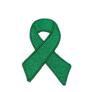 May include: Green ribbon awareness patch.  The ribbon is made of a soft, textured fabric.