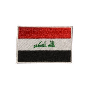 May include: An embroidered patch of the Iraqi flag. The flag is red, white, and black with the Arabic phrase "Allahu Akbar" in green.