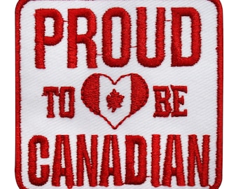 May include: Red embroidered patch with white background. The patch says "Proud to be Canadian" with a red heart containing the Canadian flag in the center.