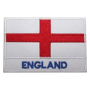 May include: White embroidered patch with a red cross and the word "ENGLAND" in blue lettering.