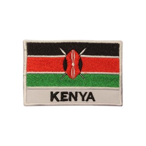 May include: Embroidered patch featuring the flag of Kenya. The flag is red, black, and green with a white shield and two crossed spears in the centre. The word "KENYA" is written in black letters on a white background.