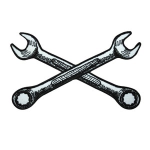 Könnte beinhalten: Schwarz-weiß-Illustration von zwei gekreuzten Schraubenschlüsseln.