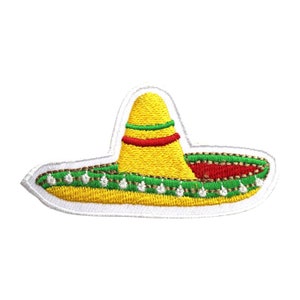 May include: An embroidered patch depicting a sombrero in yellow, green and red. The patch has a white border.